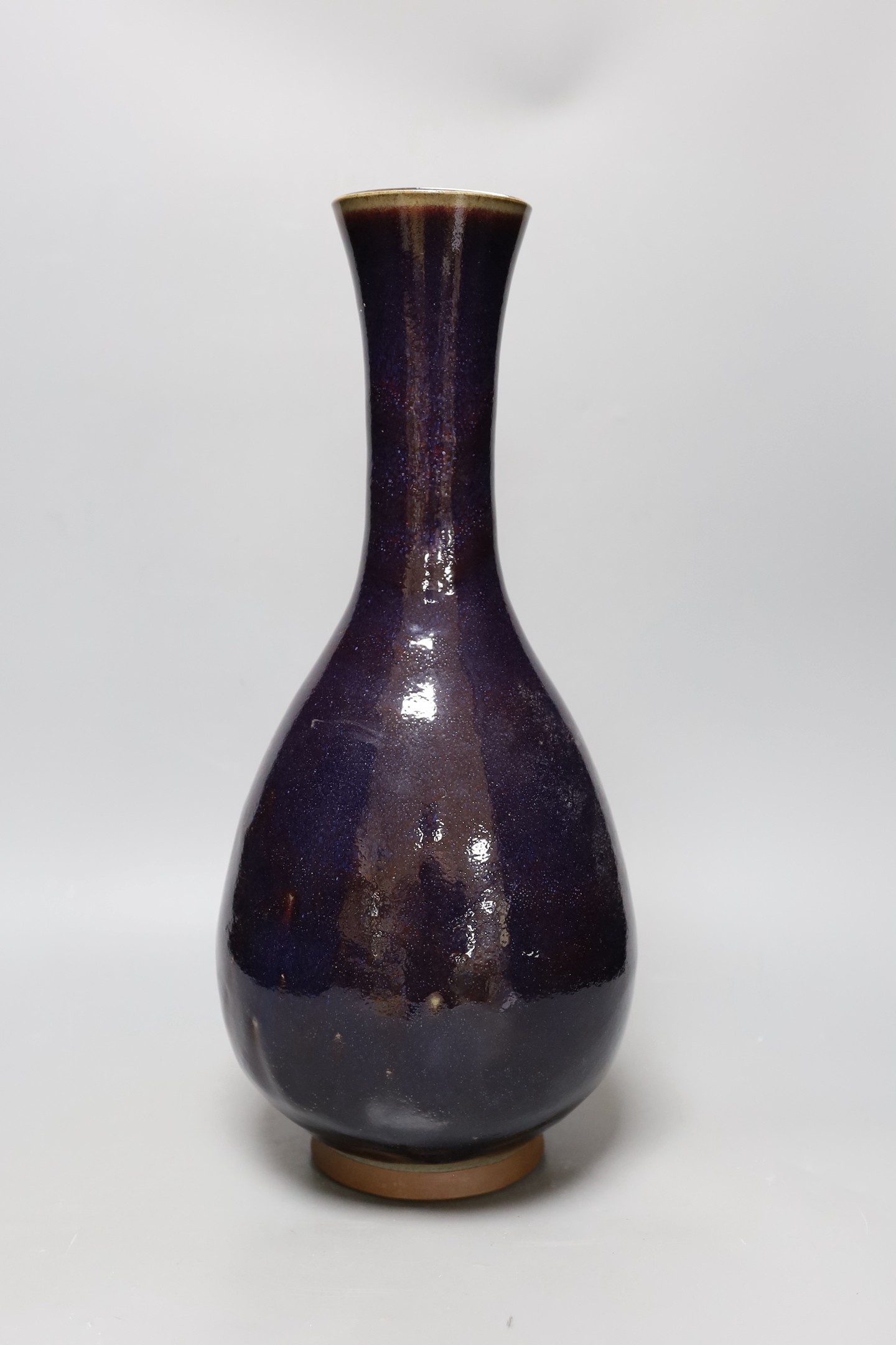 A Chinese aubergine glaze large bottle vase, 46cm